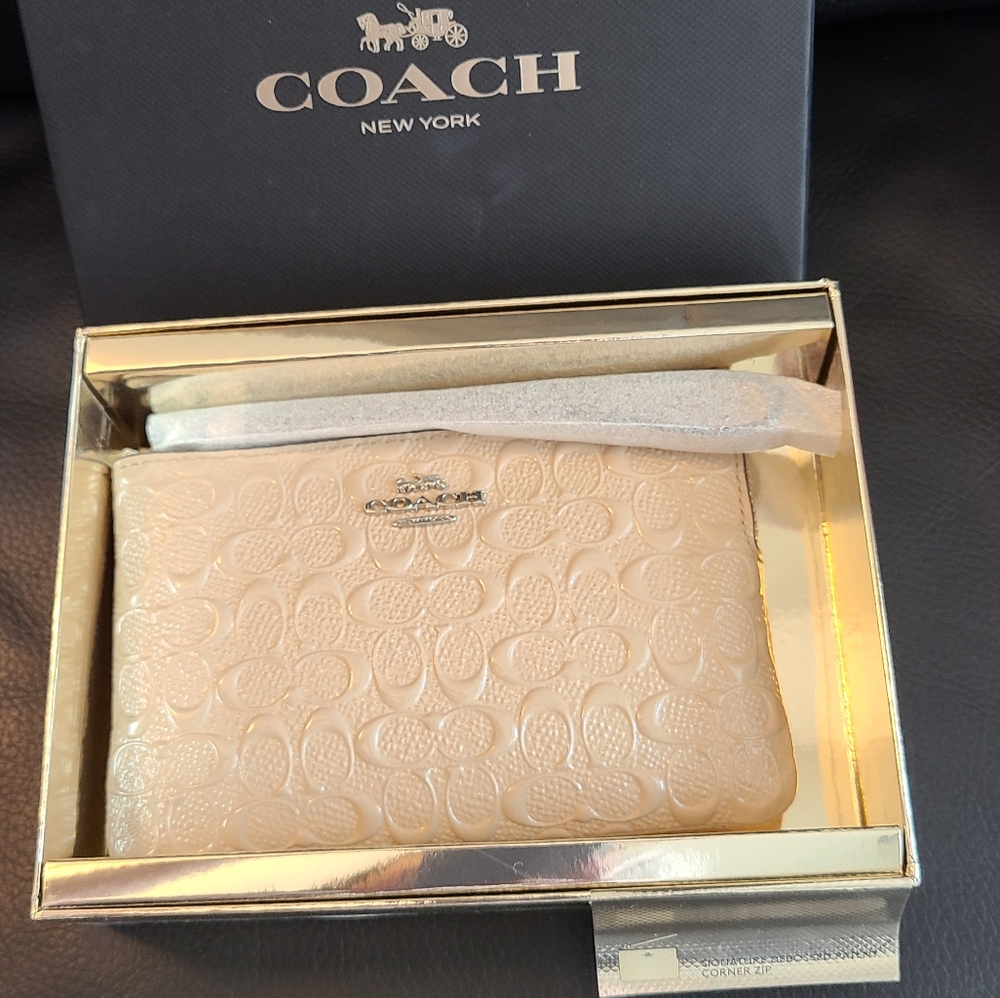 Coach Signature Embossed Wristlet